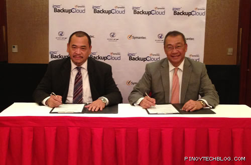 Luichi Robles, Symantec's Senior Country Manager and IP-Converge President Reynaldo R. Huergas seals partnership for IPC BackupCloud