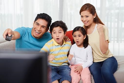 Parents and children watching television, Three Quarter Length, Front View, Side View, Waist Up
